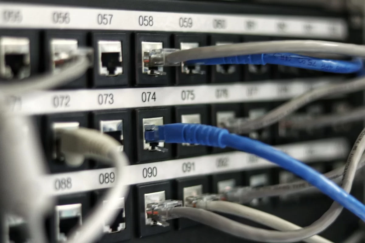 Colorful network cable connections in a server rack representing modern infrastructure automation